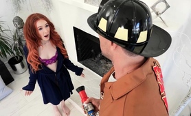 firefighter-puts-out-redhead-milf-s-fire-with-his-big-cock