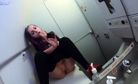 wild-babe-fingering-herself-to-climax-in-public-toilet